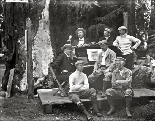 Group portrait of men around piano, Bohemian Grove
